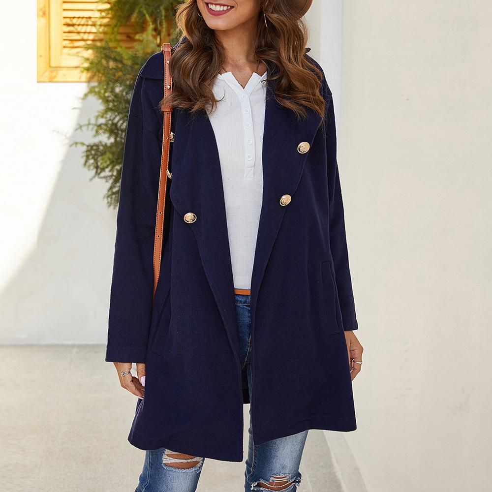 Manteau trench bleu marine à col revers, double boutonnage, poches obliques et épaules tombantes